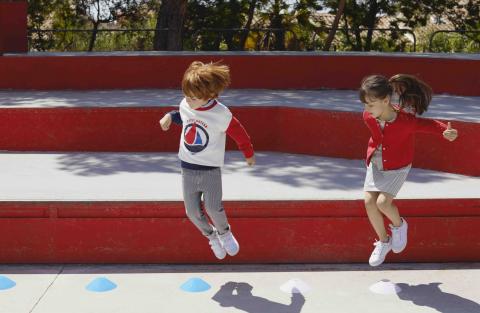 Children playing dressed in Petit Bateau